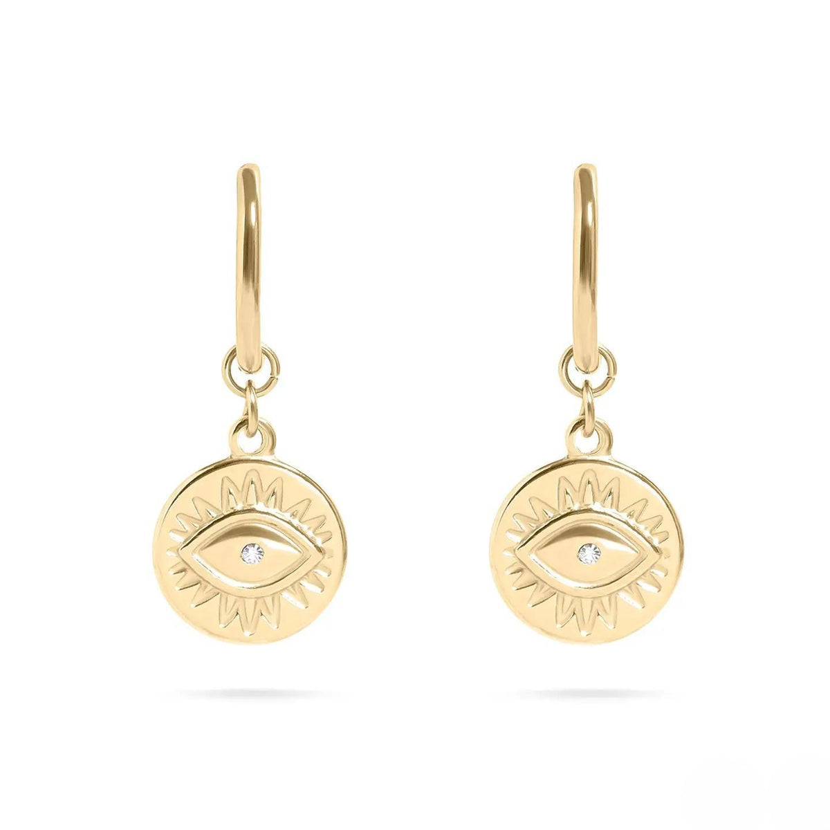 Gold earrings with eye design on a white background