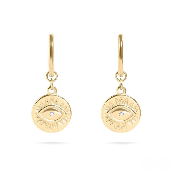 Gold earrings with eye design on a white background
