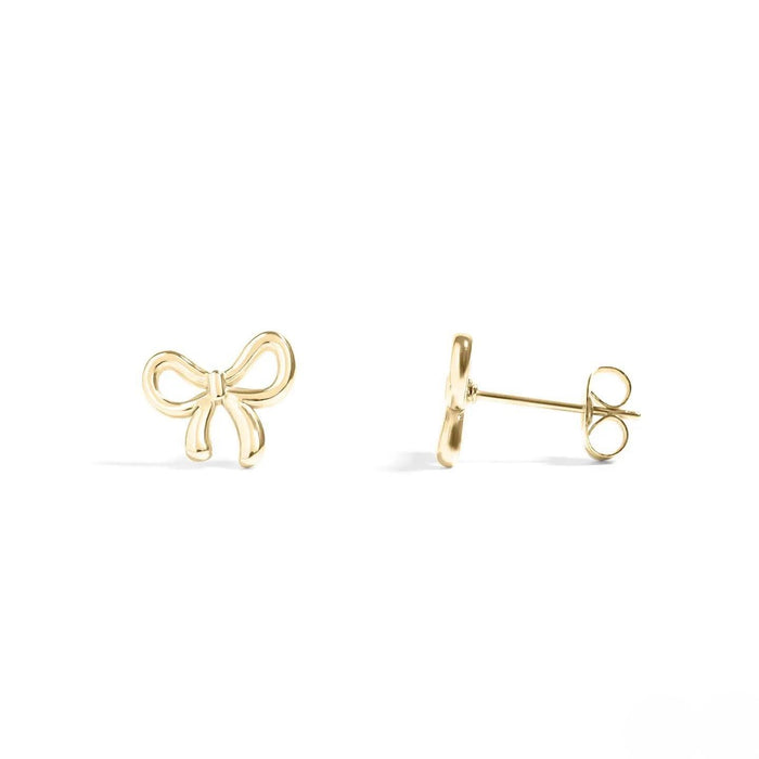 Gold bow-shaped earrings on a white background
