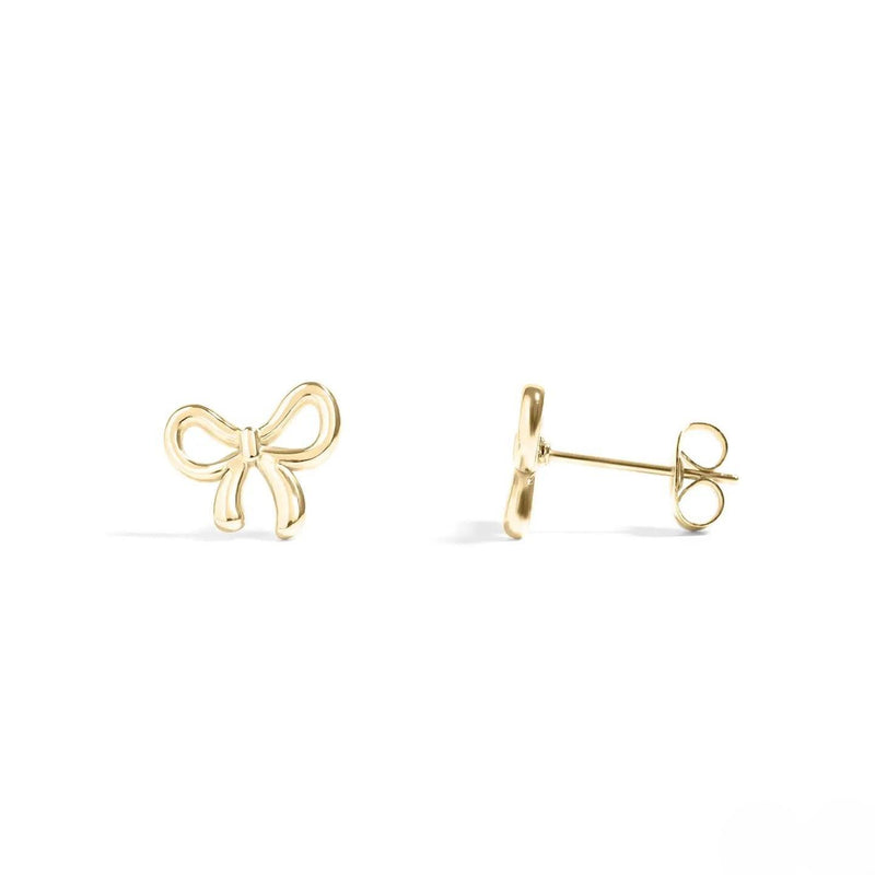 Gold bow-shaped earrings on a white background