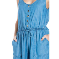 Blue denim dress with button details on a white background