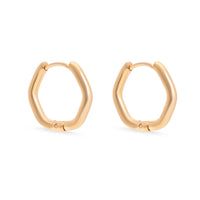 Small 18K gold geometric huggie hoop earrings from Cashato – minimalist, waterproof, and tarnish-resistant jewelry.