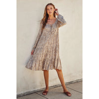 Model wearing Dress Forum ditsy floral scoop-neck tiered midi dress with tie neckline and bubble sleeves