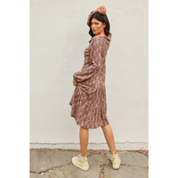 Back view of Golden Sun Tiered Midi Dress with scoop neckline and relaxed fit